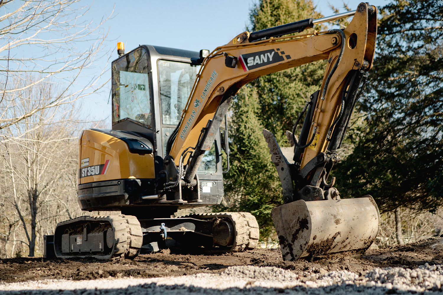 Sany excavator on a residential hardscape job site