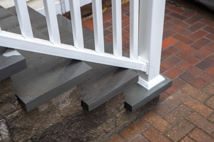 Stairs on a back patio with bluestone treads.